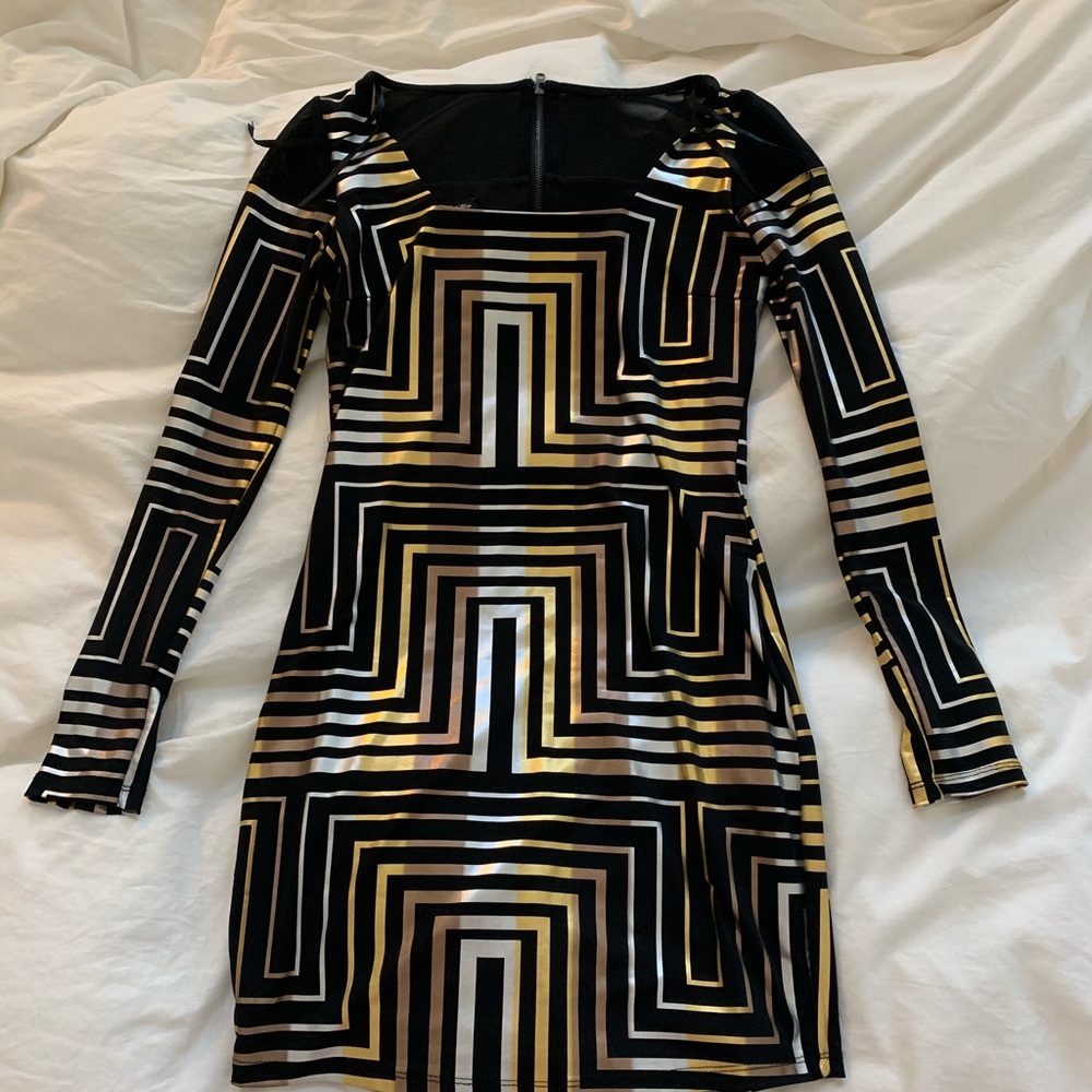 NWT super cute black and gold BEBE dress